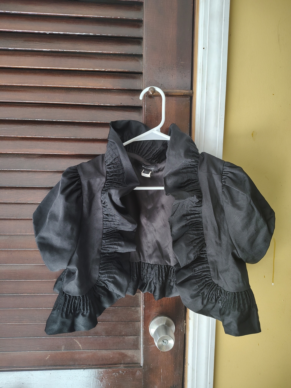 Nikibiki Black Ruffled Bolero Jacket for Girls